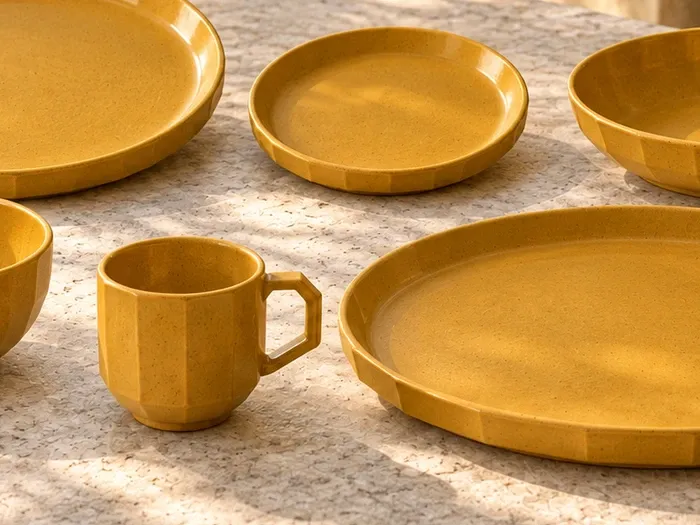 A close detail of Manjal stoneware forms and glaze.