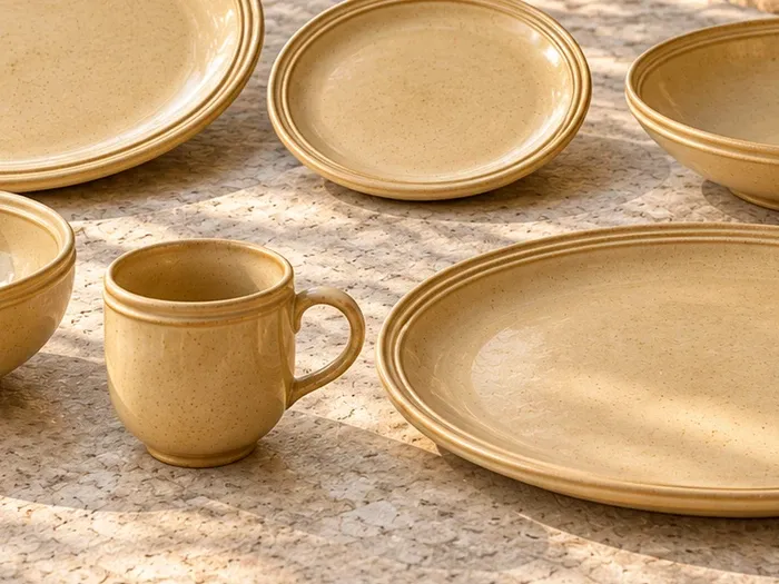 A close detail of Shenbagam stoneware forms and glaze.