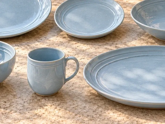 A close detail of Vaanam stoneware forms and glaze.