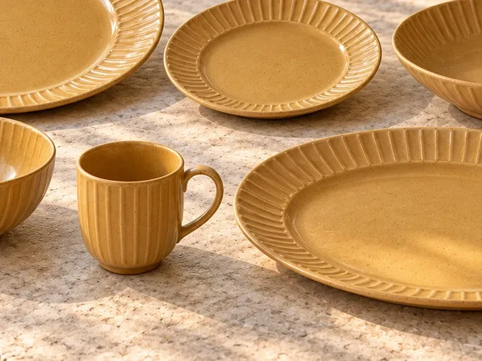 A close detail of Veyil stoneware forms and glaze.